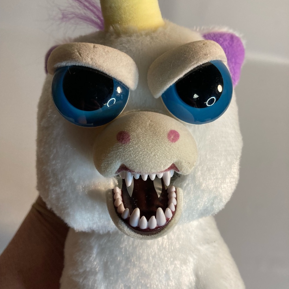 Fiesty pets unicorn plush 8”.